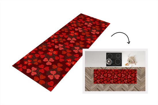 Tapis de cuisine rouge foncé avec un motif de trèfles rouges et de pois.