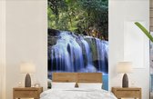 Behang - Fotobehang Rotsen onder de watervallen van nationaal park Erawan - Breedte 120 cm x hoogte 240 cm