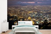 Behang - Fotobehang Luchtfoto van Bogota in Colombia in de nacht - Breedte 390 cm x hoogte 260 cm