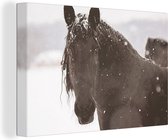 Canvas Schilderij Fries paard in de sneeuw - 30x20 cm - Wanddecoratie