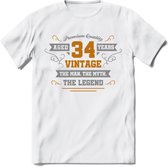 34 Jaar Legend T-Shirt | Goud - Zilver | Grappig Verjaardag Cadeau | Dames - Heren | - Wit - 3XL