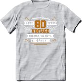 80 Jaar Legend T-Shirt | Goud - Wit | Grappig Verjaardag en Feest Cadeau Shirt | Dames - Heren - Unisex | Tshirt Kleding Kado | - Licht Grijs - Gemaleerd - XL
