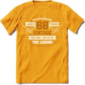 68 Jaar Legend T-Shirt | Goud - Wit | Grappig Verjaardag en Feest Cadeau Shirt | Dames - Heren - Unisex | Tshirt Kleding Kado | - Geel - M