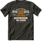 32 Jaar Legend T-Shirt | Goud - Wit | Grappig Verjaardag en Feest Cadeau Shirt | Dames - Heren - Unisex | Tshirt Kleding Kado | - Donker Grijs - XL