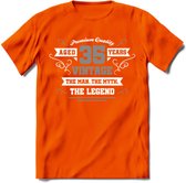 35 Jaar Legend T-Shirt | Zilver - Wit | Grappig Verjaardag en Feest Cadeau | Dames - Heren - Unisex | Kleding Kado | - Oranje - XL