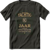 80 Jaar Legendarisch Gerijpt T-Shirt | Mos - Ivoor | Grappig Verjaardag en Feest Cadeau Shirt | Dames - Heren - Unisex | Tshirt Kleding Kado | - Donker Grijs - M