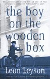 Boy On The Wooden Box
