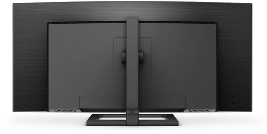 Achterkant van een gebogen Philips monitor met een zwart frame, een verstelbare standaard en USB-C poorten aan de zijkant.