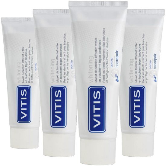 Vier tubes Vitis whitening tandpasta met blauwe logo's. Tekst: Maakt de tanden effectief witter.