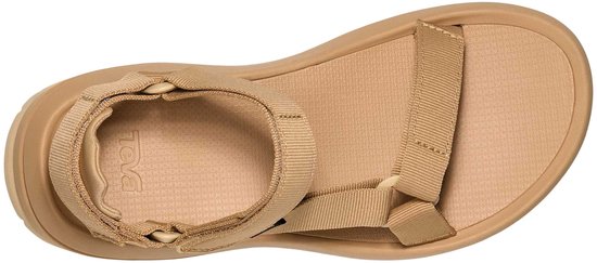 Paar beige Teva sandalen, van bovenaf bekeken, met stoffen banden.