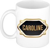 Caroline naam cadeau mok / beker met gouden embleem - kado verjaardag/ moeder/ pensioen/ geslaagd/ bedankt