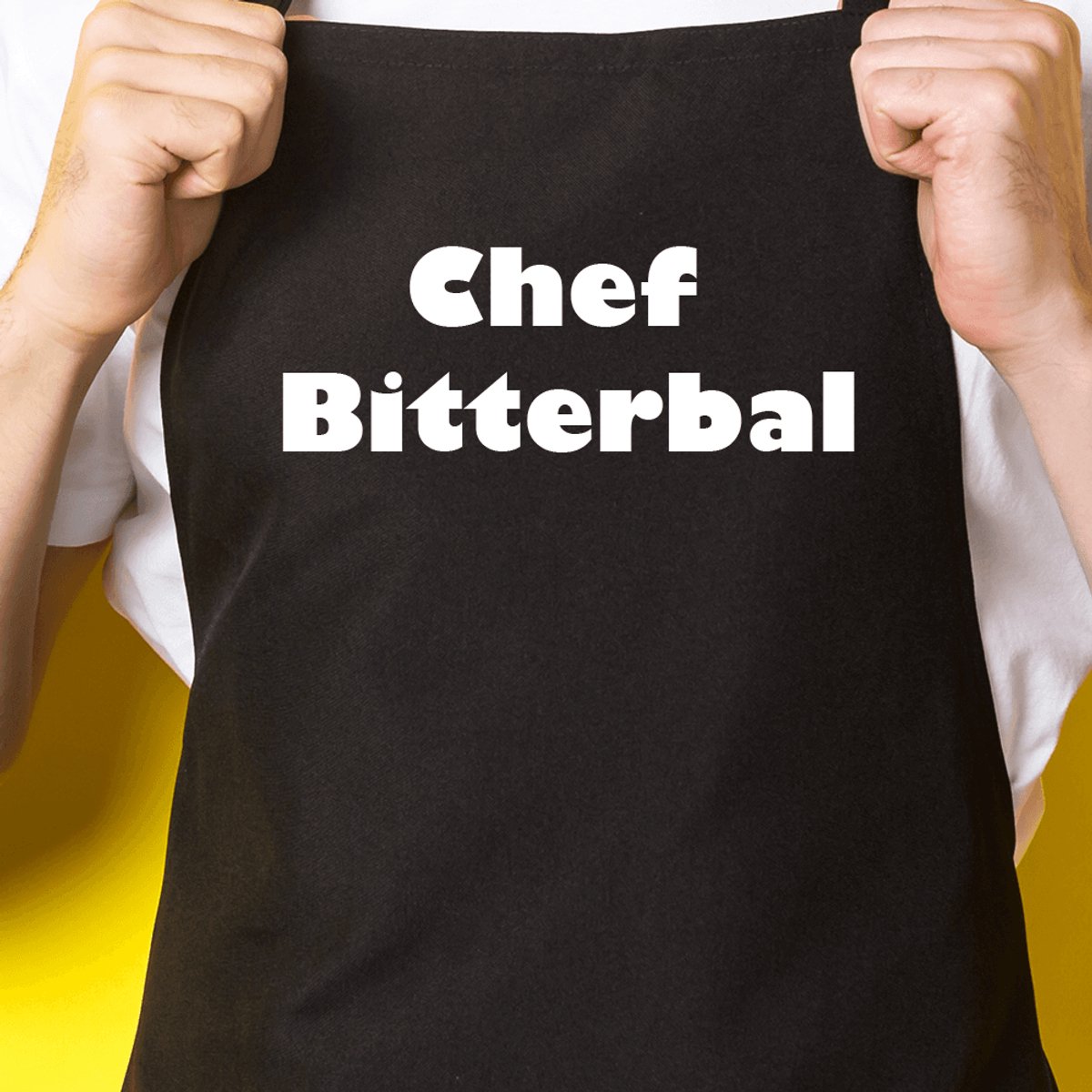 Zwart keukenschort / BBQ-schort met tekst | Chef Bitterbal | Katoen - One size - Verstelbaar - Wasbaar - Cadeau voor hem - Vaderdag - Gratis verzending - Cadeau voor Kerst & sinterklaas | Incl. 2 jaar garantie