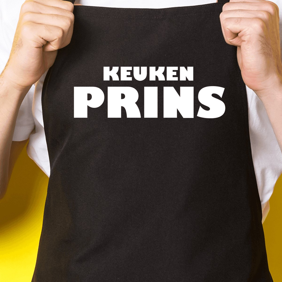 Zwart keukenschort / BBQ-schort met tekst | Keuken Prins | Katoen - One size - Verstelbaar - Wasbaar - Cadeau voor hem - Vaderdag - Gratis verzending - Cadeau voor Kerst & sinterklaas | Incl. 2 jaar garantie