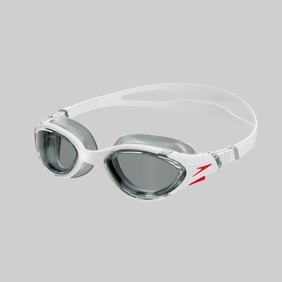 Witte Speedo zwembril met grijze glazen en rode 'Speedo' logo's aan de zijkant.