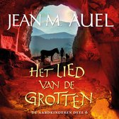 Boekomslag 'Het Lied van de Grotten' van Jean M. Auel. Silhouetten van een vrouw, hond en paard staan bij een grotuitgang met berglandschap.