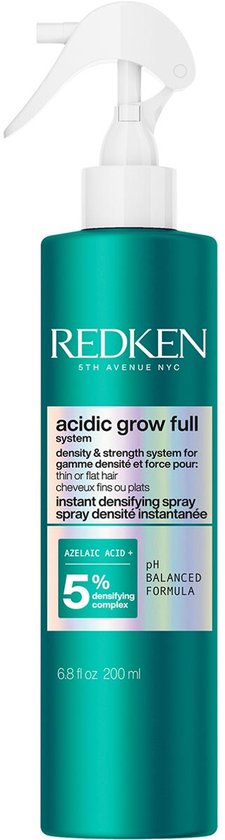 Groene fles Redken 'acidic grow full system' spray met een witte spuitdop en het label 'instant densifying spray'.