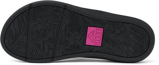 Zwarte Reef slippers met een felroze Reef logo op de zool.
