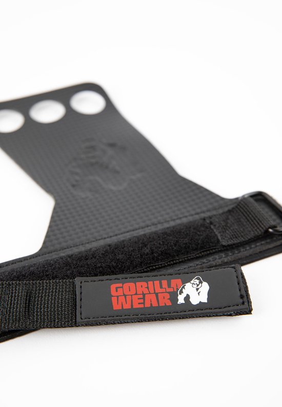 Close-up van een zwarte Gorilla Wear grip met rood logo en klittenbandsluiting.