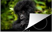 KitchenYeah® Inductie beschermer 76x51.5 cm - Close-up jonge gorilla - Kookplaataccessoires - Afdekplaat voor kookplaat - Inductiebeschermer - Inductiemat - Inductieplaat mat