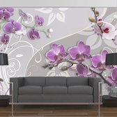 Fotobehangkoning - Behang - Vliesbehang - Fotobehang - Flight of purple orchids - Paarse Orchideeën - Bloemen - 200 x 140 cm