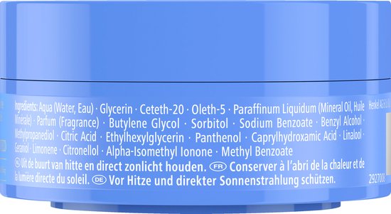 Zij-aanzicht van de ingrediëntenlijst op een blauwe pot Taft Ultra Gel Wax.