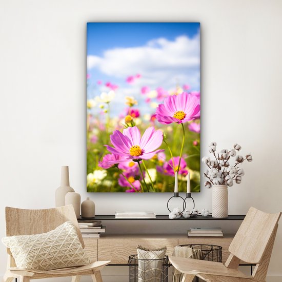 Canvas schilderij 90x140 cm - Wanddecoratie Bloemen - Wei - Paars - Gras - Wit - Wolken - Blauw - Muurdecoratie woonkamer - Slaapkamer decoratie - Kamer accessoires - Schilderijen op canvas