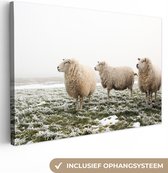 Canvas schilderij 140x90 cm - Wanddecoratie Schapen - Mist - Winter - Muurdecoratie woonkamer - Slaapkamer decoratie - Kamer accessoires - Schilderijen