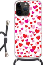 Geschikt voorApple Iphone 14 Pro - Crossbody Case - Een illustratie met kleurrijke hartjes - Siliconen - Crossbody - Backcover met Koord - Telefoonhoesje met koord - Hoesje met touw