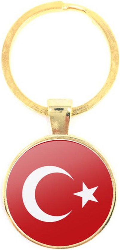 Porte-clés doré avec pendentif rond du drapeau turc, avec étoile et croissant blancs sur fond rouge.