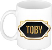 Naam cadeau mok / beker Toby met gouden embleem 300 ml