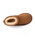 Bovenaanzicht van een bruine suède kinderlaars met pluche beige voering.