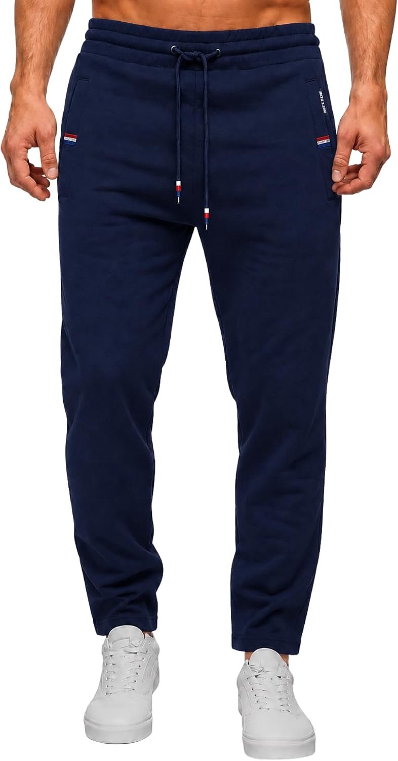 Trainingsbroek voor Heren. Lange Trainingsbroek. Elastische Trainingsbroek met Verstelbaar Koord en Zakken met Ritssluiting.