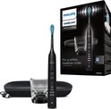 Zwarte Philips Sonicare 9000 DiamondClean tandenborstel met oplaadglas, reisetui en doos met 'For a whiter, healthier smile'.