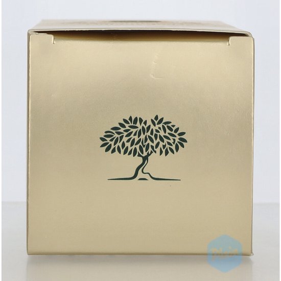 Gouden verpakking met een groene boomafbeelding erop.