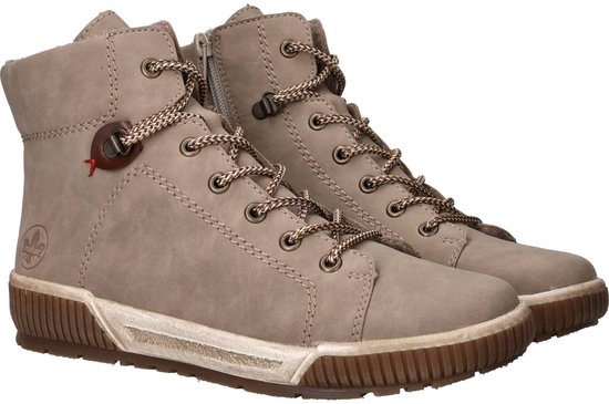 Beige Rieker veterboots met rits, bruine veters en rubberen zool.