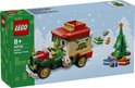 LEGO 40746 Bezorgtruck van de Kerstman, met elf, kerstboom en cadeautjes op een besneeuwde achtergrond.