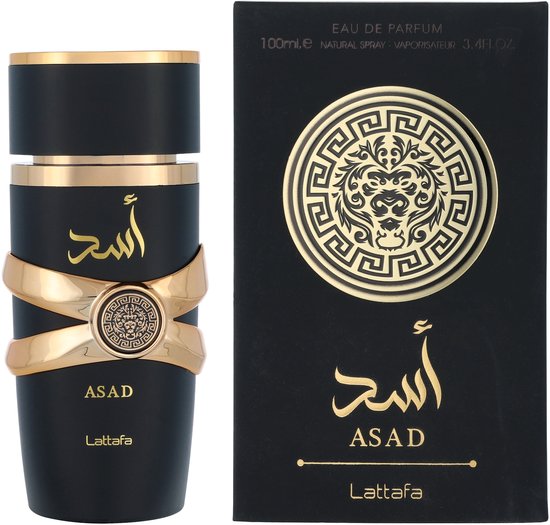 Zwarte Lattafa Asad parfumfles en bijbehorende doos, versierd met gouden leeuwemblemen en Arabische tekst.