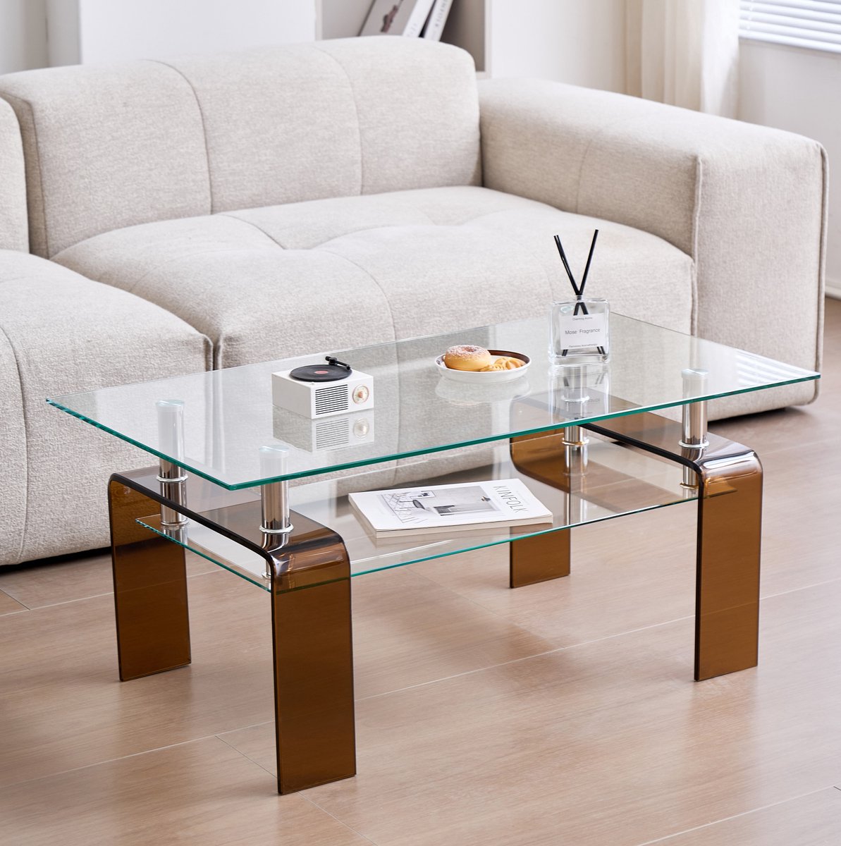 MEUNIQ Salontafel 100 x 55 x 45 cm van gehard glas, dubbele laag met opbergplank, metalen steunen en bruine glazen poten voor woonkamer Transparant