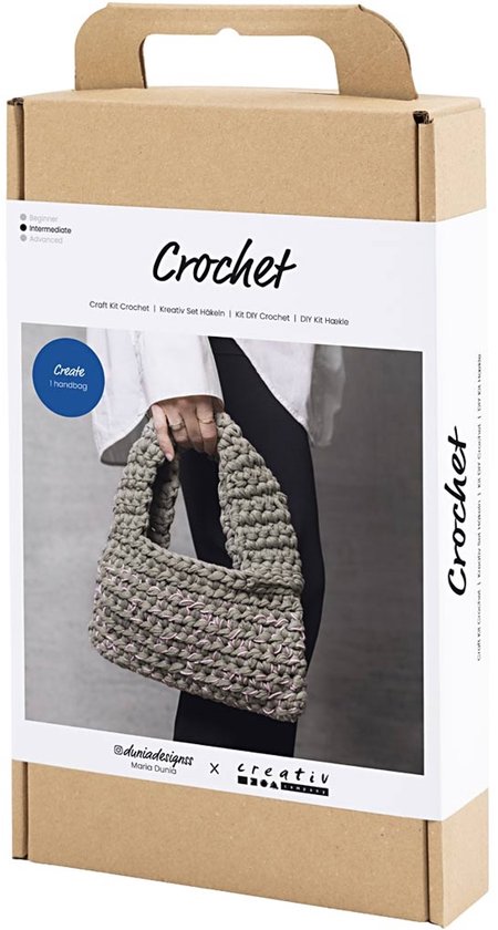 Doos met "Crochet" erop, met een afbeelding van een grijze gehaakte tas.