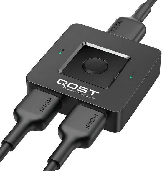 Commutateur HDMI noir avec le logo QOST, deux entrées avec câbles HDMI et deux voyants verts.