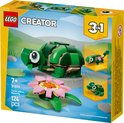 LEGO Creator 3in1 doos. Toont een schildpad met waterlelie, kameleon en kikker. Leeftijd 7+, 124 onderdelen.