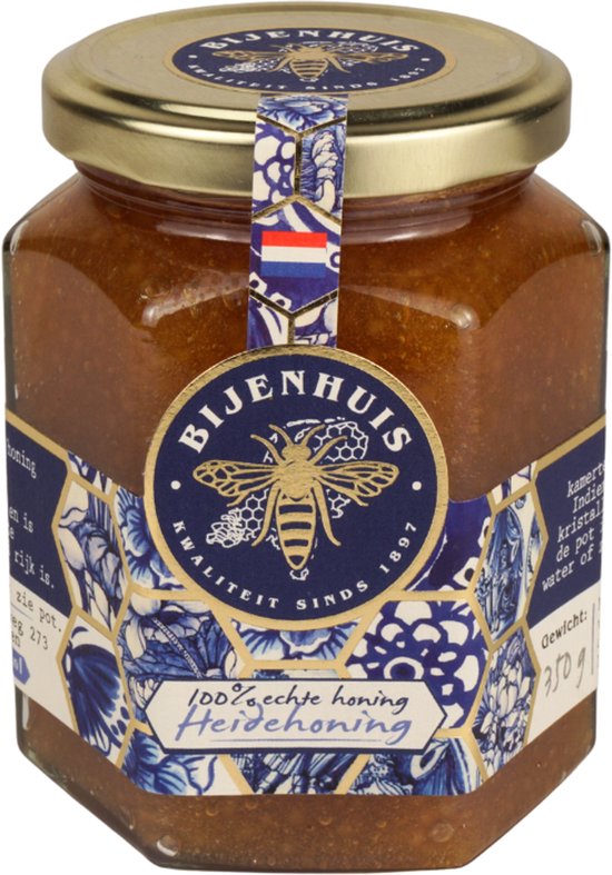 Hexagonale pot 350g met honing, etiket met bijen, Delfts blauw patronen, '100% echte honing Heidehoning'.