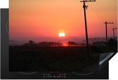 KitchenYeah® Inductie beschermer 76x51.5 cm - Een afbeelding van de zonsondergang bij een weg met elektrische polen in het prachtige Santa Marta - Kookplaataccessoires - Afdekplaat voor kookplaat - Inductiebeschermer - Inductiemat - Inductieplaat mat