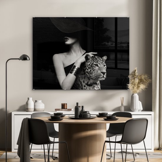 MuchoWow® Glasschilderij 120x90 cm - Schilderij acrylglas - Vrouw - Luipaard - Luxe - Zwart - Wit - Dier - Foto op glas - Muurdecoratie woonkamer - Wanddecoratie slaapkamer - Schilderijen