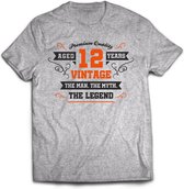 12 Jaar Legend - Feest kado T-Shirt Heren / Dames - Antraciet Grijs / Oranje - Perfect Verjaardag Cadeau Shirt - grappige Spreuken, Zinnen en Teksten. Maat XXL