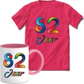 82 Jaar Vrolijke Verjaadag T-shirt met mok giftset Roze | Verjaardag cadeau pakket set | Grappig feest shirt Heren – Dames – Unisex kleding | Koffie en thee mok | Maat 3XL