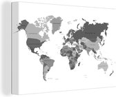 Canvas Wereldkaart - 90x60 - Wanddecoratie De landen zijn met verschillende tinten grijs aangegeven op de wereldkaart - zwart wit