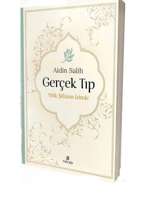 Een crèmekleurig boek met de titel 'Gercek Tip' in sierlijke letters, met bloemmotieven en een plantje in een ornament.