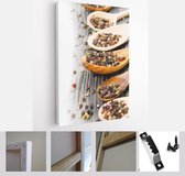 Photo of spoons with pepper seeds on wooden board with white space for text - Modern Art Canvas - Vertical - 290056169 - 115*75 Vertical