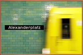 JUNIQE - Poster met kunststof lijst Reaching Alex -40x60 /Geel &